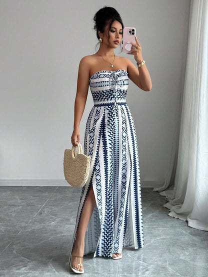 👗 50% OFF NOW! 💥 Geometric Jumpsuit with Halter Neckline & Side Slit – Unique print & elastic back – Versatile, perfect for summer parties or resort wear ✨